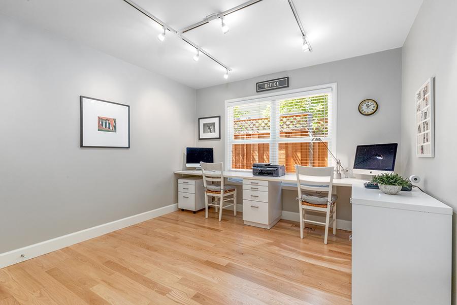 2171 Cedar Avenue Menlo Park, CA 94025 - Photo 15 of 45 a work room with furniture a flat screen tv and a fireplace