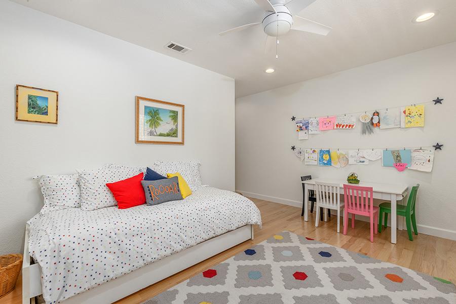 2171 Cedar Avenue Menlo Park, CA 94025 - Photo 35 of 45 a bedroom with a bed and a table in it