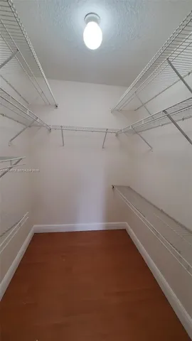 a view of a room with racks on the wall