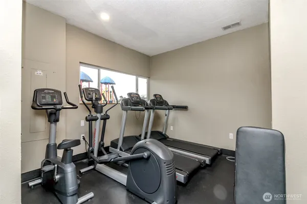 a view of a room with gym equipment