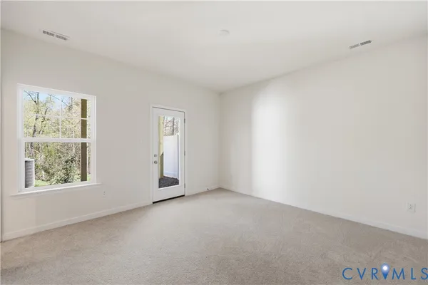 an empty room with windows