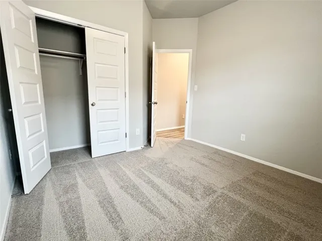 an empty room with closet