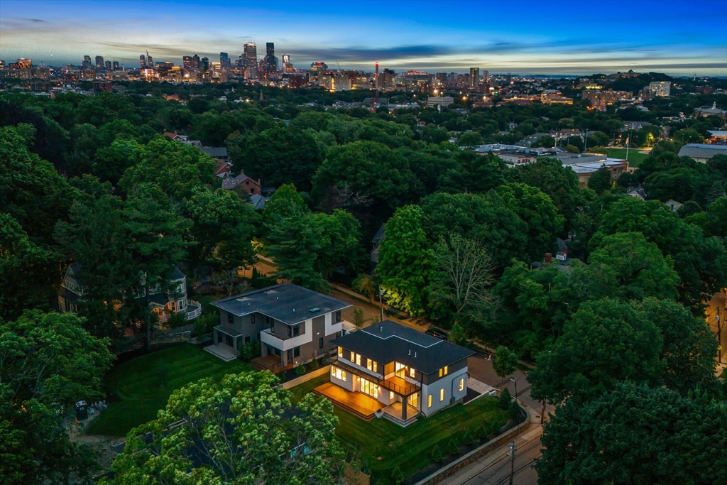 225 Gardner Road Brookline, MA 02445 - Photo 1 of 2 an aerial view of a house with garden space and outdoor seating