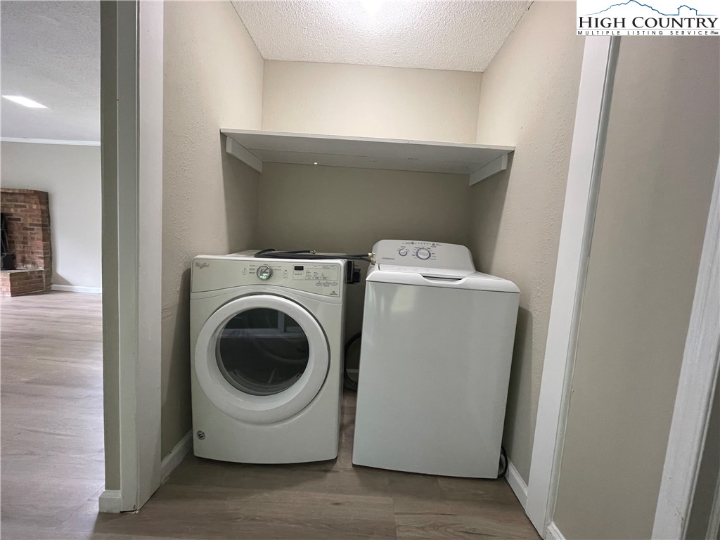 274 Bryan Davis Road Creston, NC 28615 - Photo 14 of 29 a utility room with dryer and washer