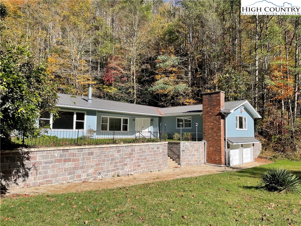 274 Bryan Davis Road Creston, NC 28615 - Photo 2 of 29 front view of a house with a yard