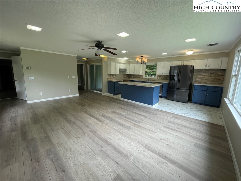 274 Bryan Davis Road Creston, NC 28615 - Photo 9 of 29 a open kitchen with a table and chairs in it