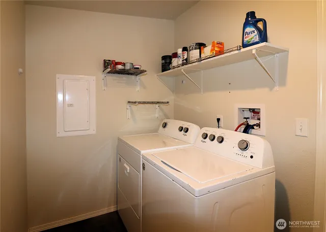 a utility room with dryer and washer