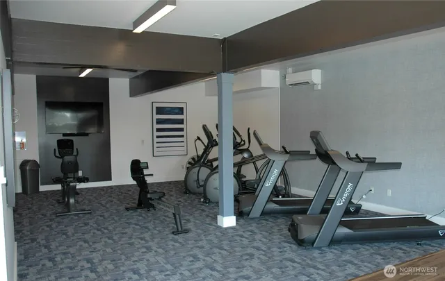 a view of a room with gym equipment