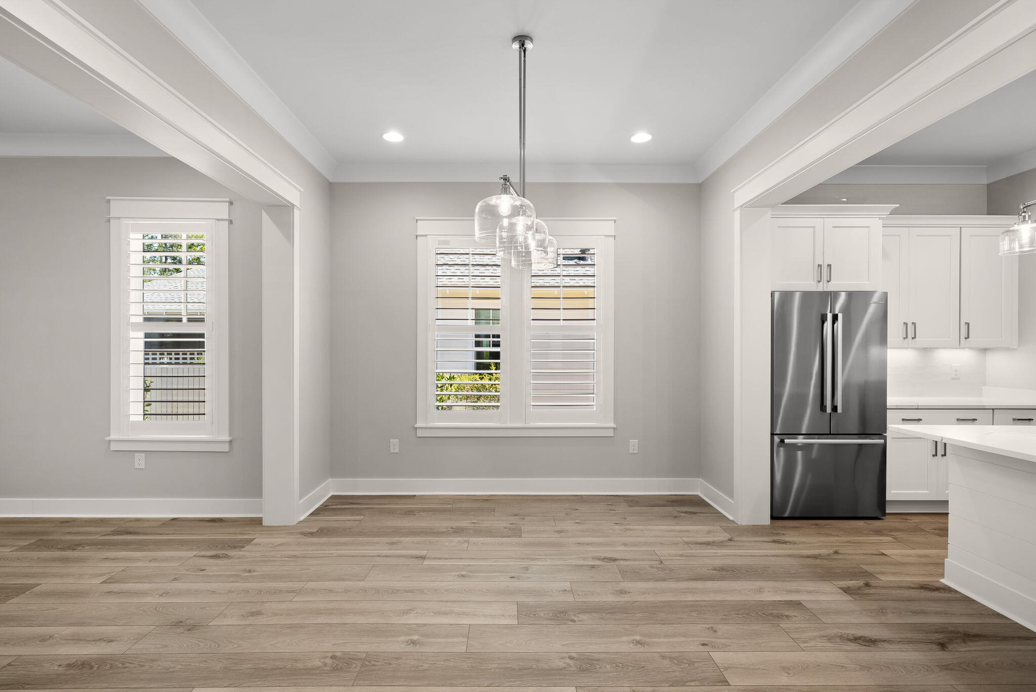 64 West Firethorn Circle Watersound, FL 32461 - Photo 15 of 63 a view of a kitchen with a sink cabinet and a window