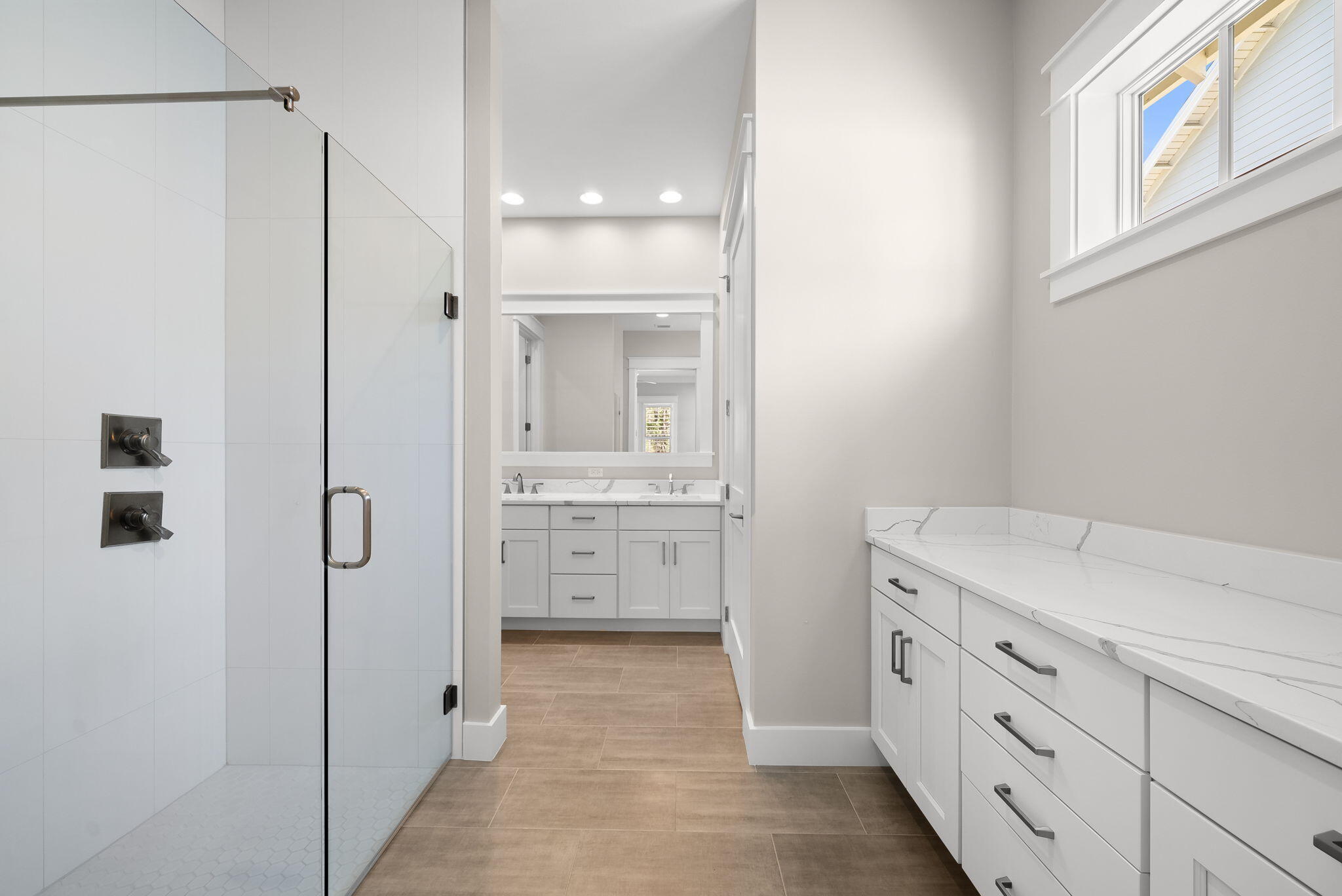 64 West Firethorn Circle Watersound, FL 32461 - Photo 20 of 63 a bathroom with a granite countertop sink mirror and double