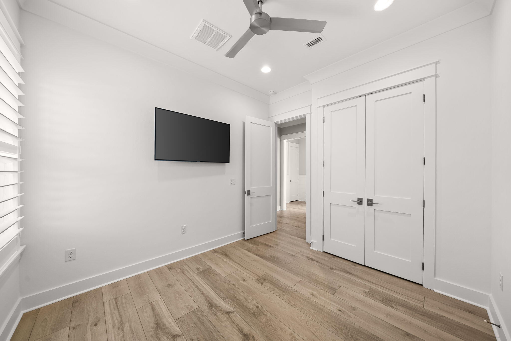 64 West Firethorn Circle Watersound, FL 32461 - Photo 28 of 63 wooden floor in an empty room