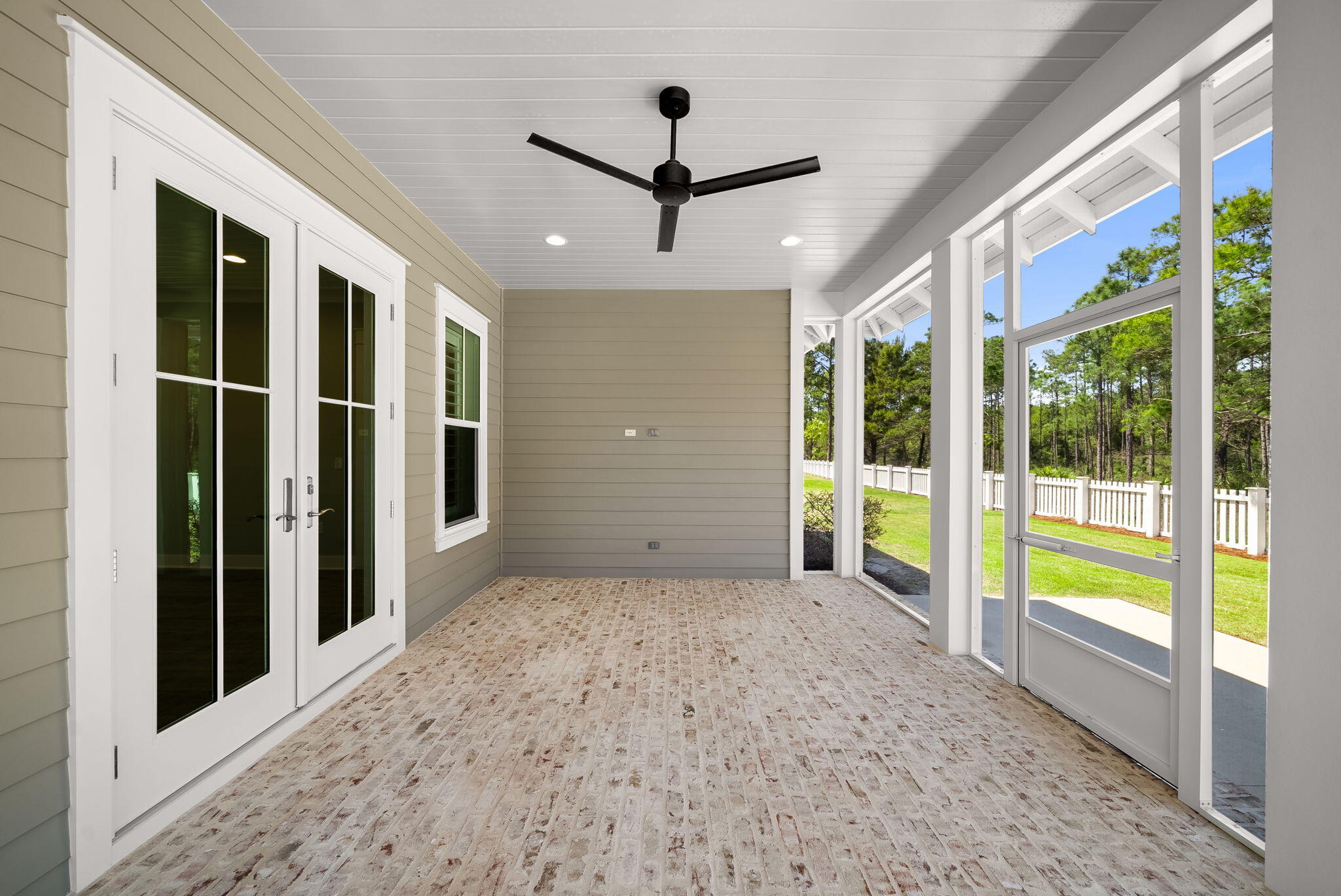 64 West Firethorn Circle Watersound, FL 32461 - Photo 34 of 63 a view of empty room with floor to ceiling windows