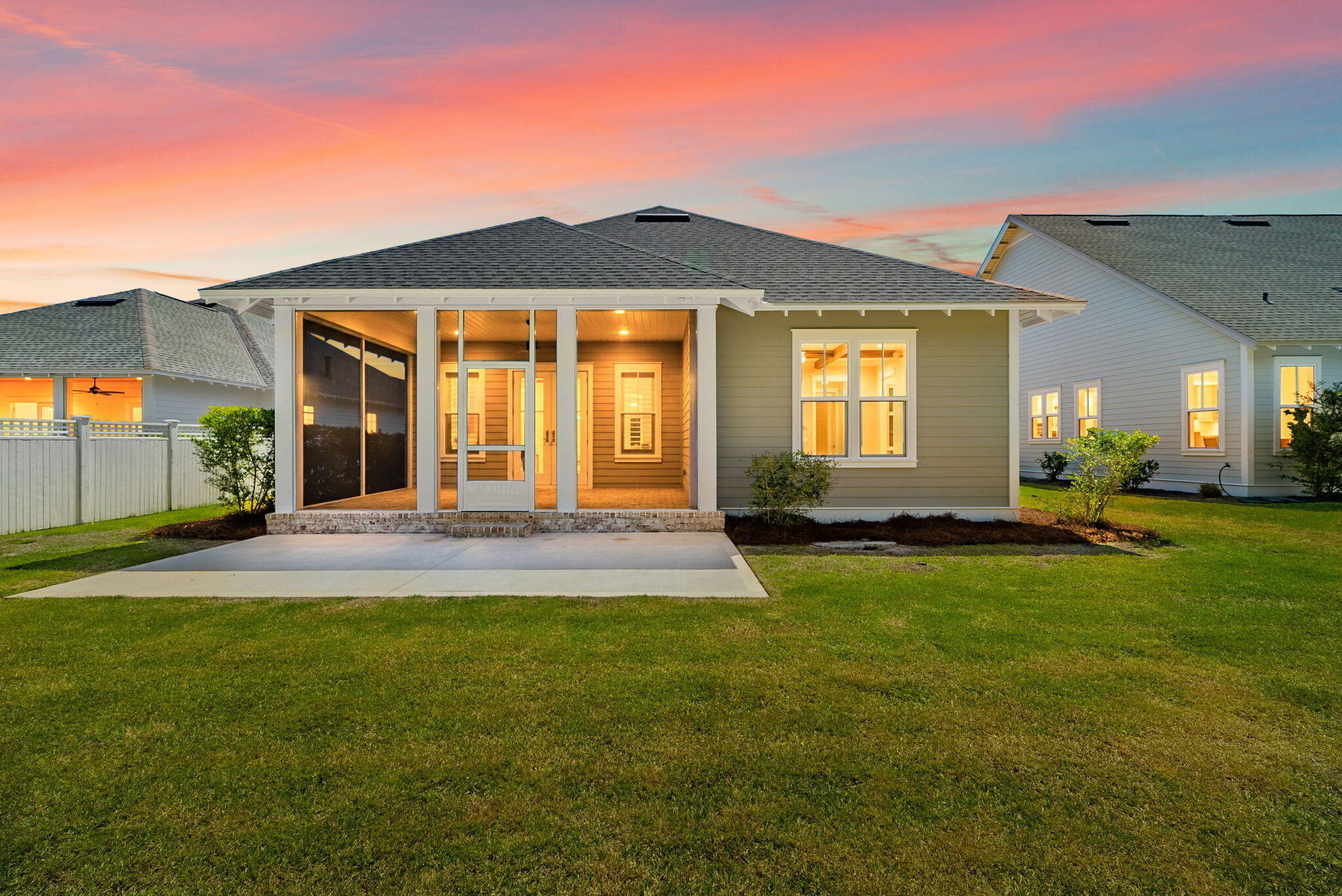 64 West Firethorn Circle Watersound, FL 32461 - Photo 37 of 63 a view of a house with a backyard
