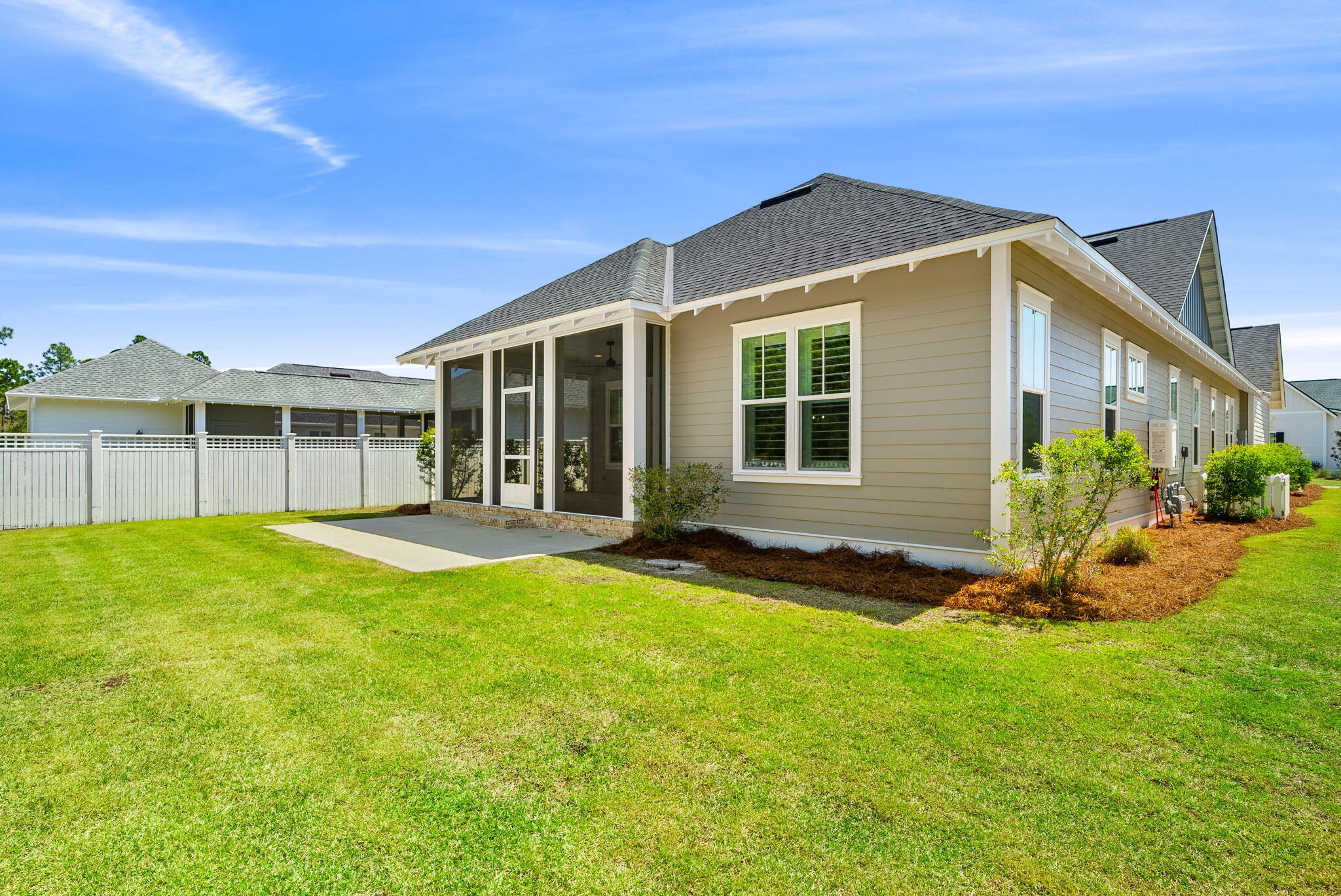 64 West Firethorn Circle Watersound, FL 32461 - Photo 39 of 63 a view of a house with backyard and porch