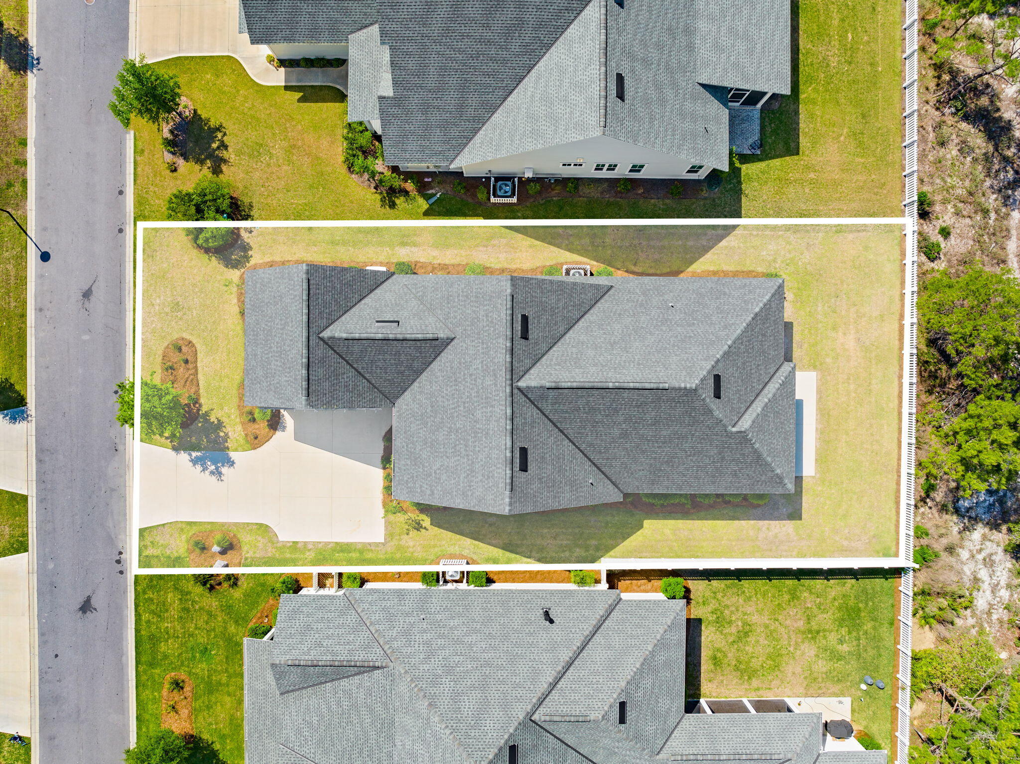 64 West Firethorn Circle Watersound, FL 32461 - Photo 40 of 63 an aerial view of a house with a swimming pool