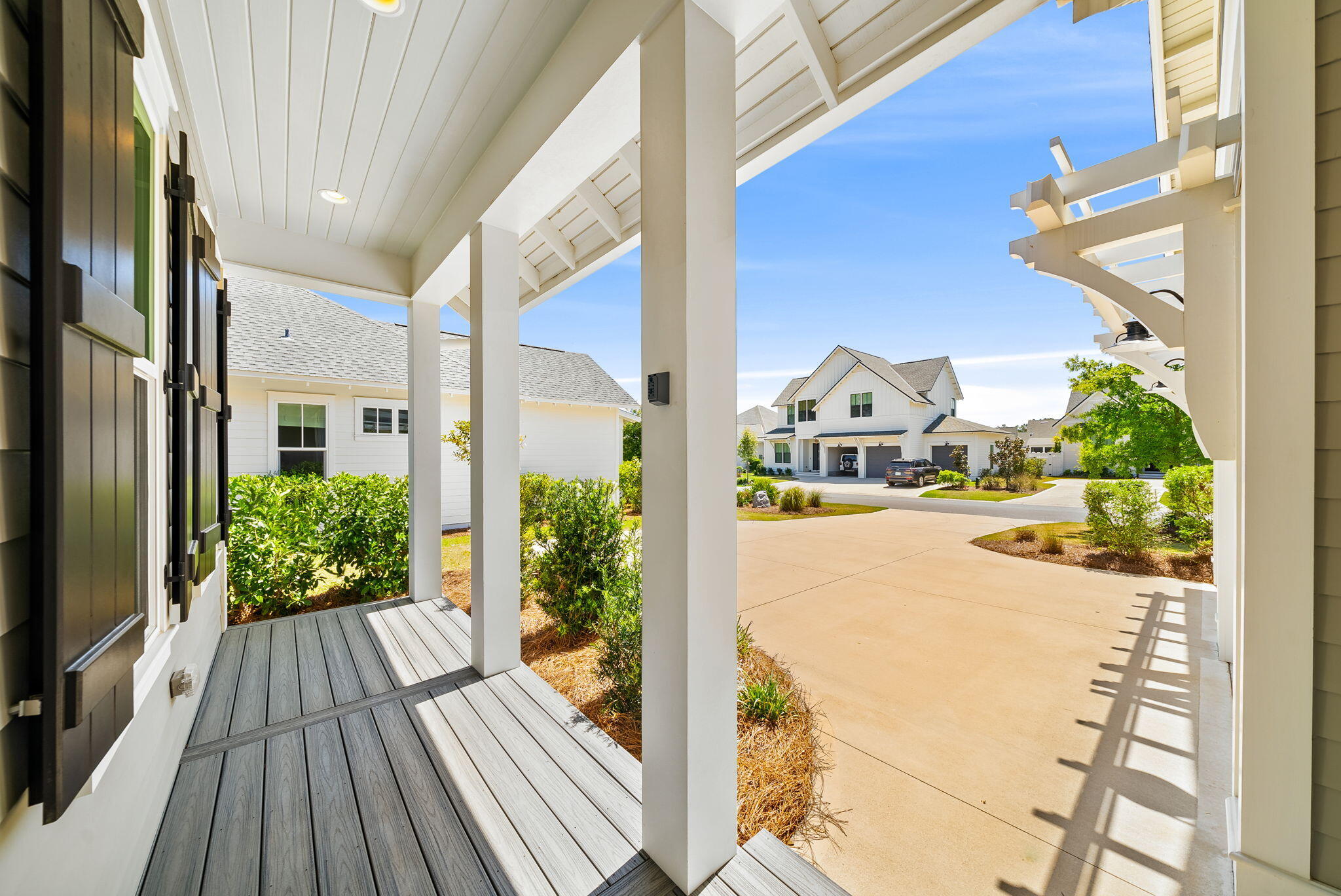 64 West Firethorn Circle Watersound, FL 32461 - Photo 6 of 63 a view of balcony with potted plants
