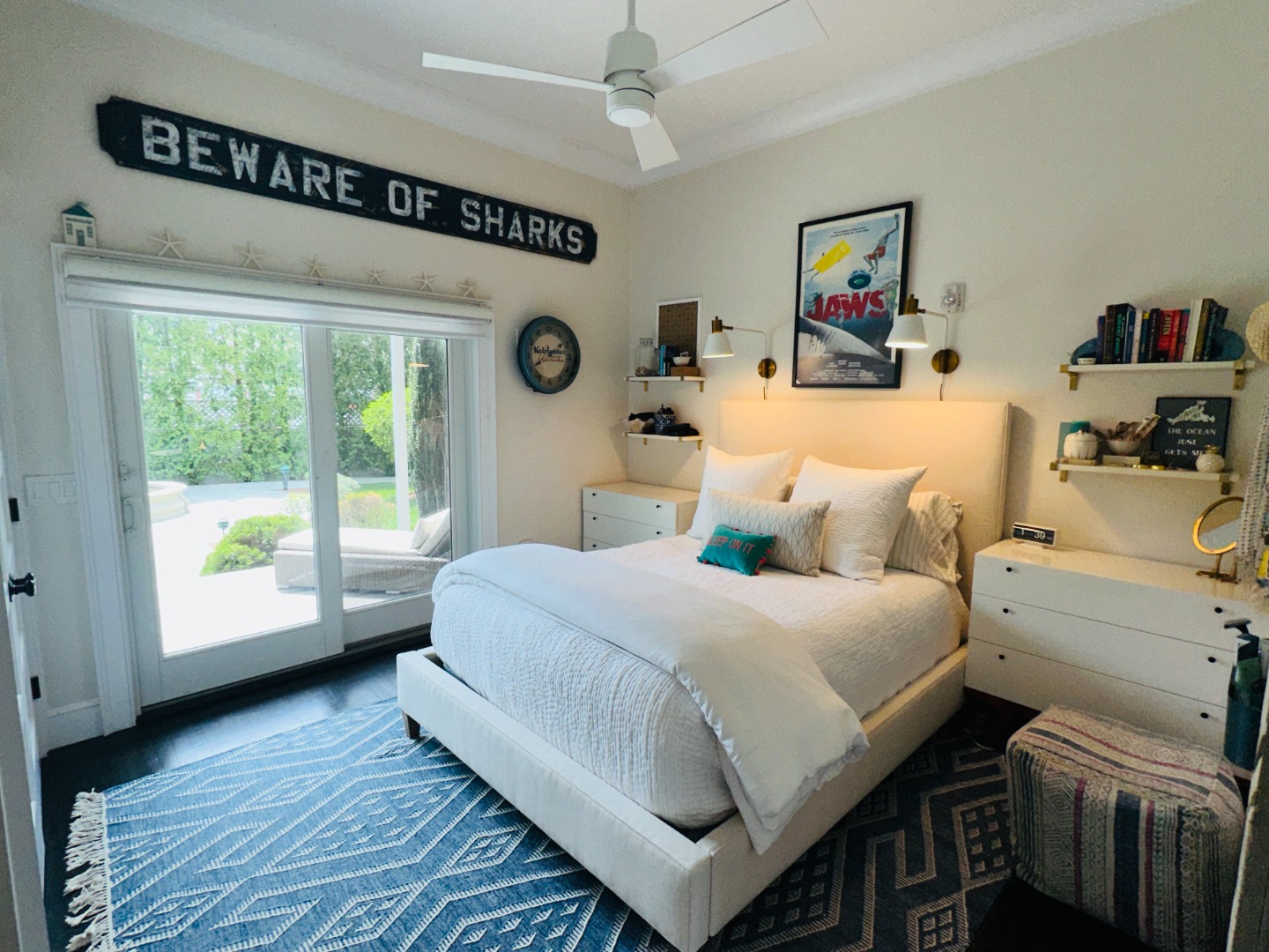 68 Winter Street, Unit 2 Edgartown, MA 02539 - Photo 11 of 19 a bedroom with a bed and a large window