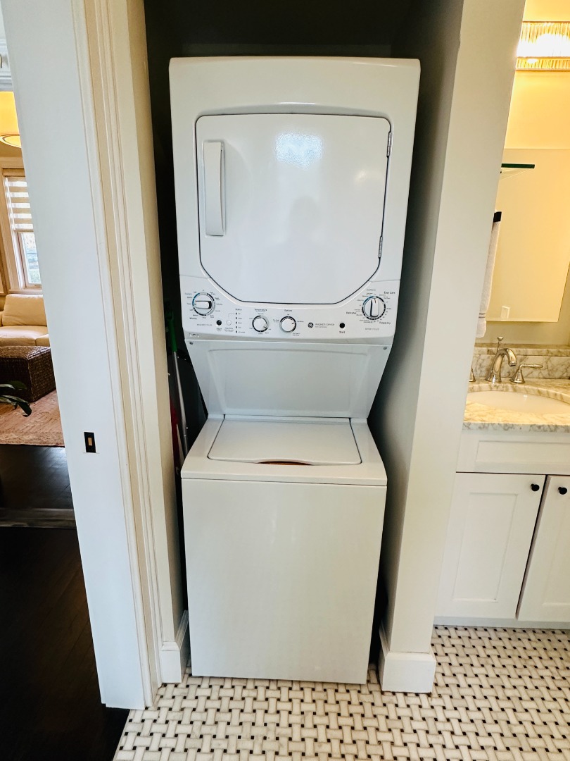 68 Winter Street, Unit 2 Edgartown, MA 02539 - Photo 15 of 19 a utility room with dryer and washer
