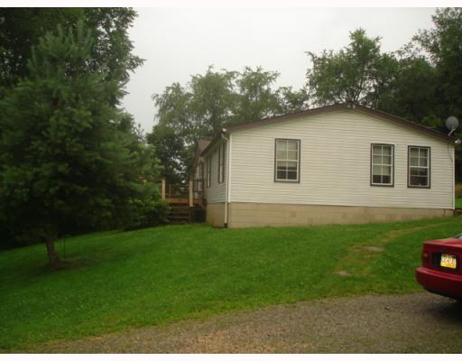 135 Layman Road Smithton, PA 15479 - Photo 2 of 11 Exterior Front.