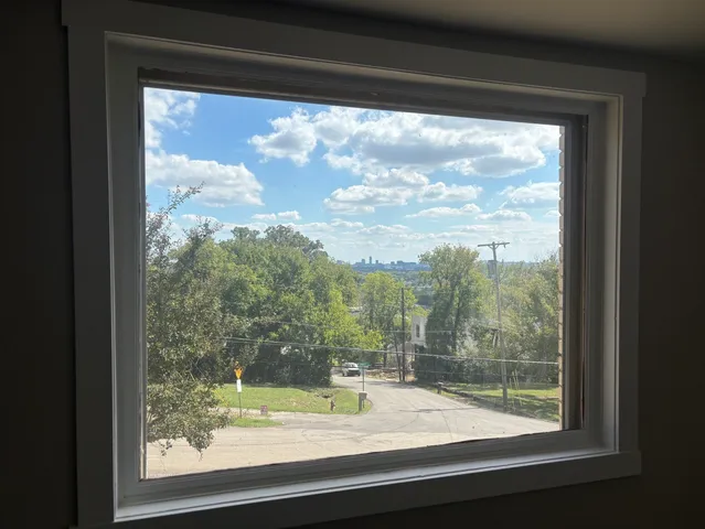 a view of a room and mountain from a window