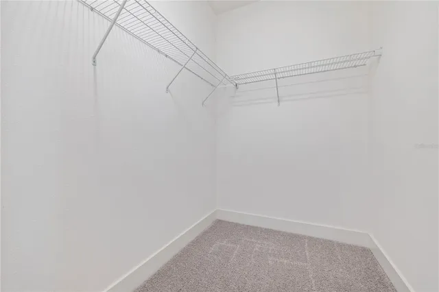 a view of a room with racks on the wall