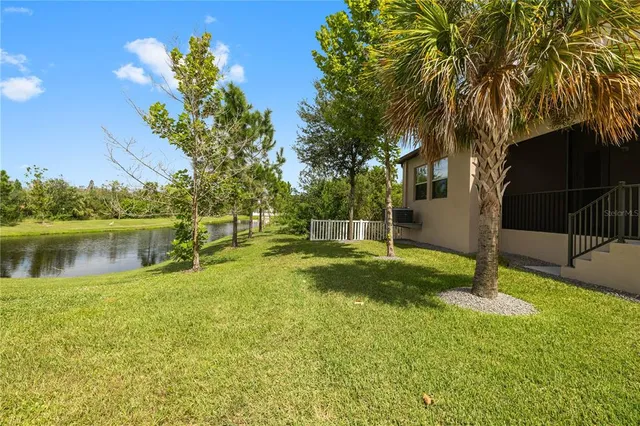 a backyard of a house with lots of green space