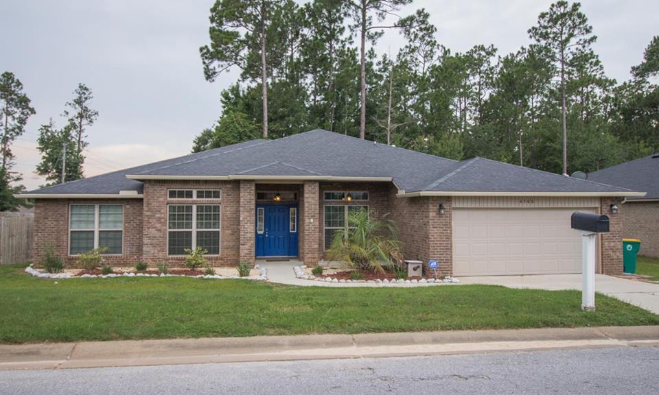 4500 Hermosa Road Crestview, FL 32539 - Photo 2 of 27 front view of a house with a yard