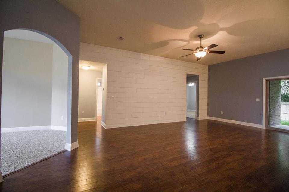 4500 Hermosa Road Crestview, FL 32539 - Photo 4 of 27 a view of an empty room with wooden floor