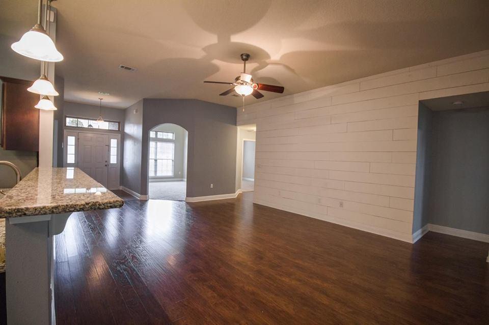 4500 Hermosa Road Crestview, FL 32539 - Photo 5 of 27 a view of a hallway with wooden floor