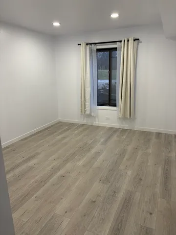 a living room with lots of furniture and a rug