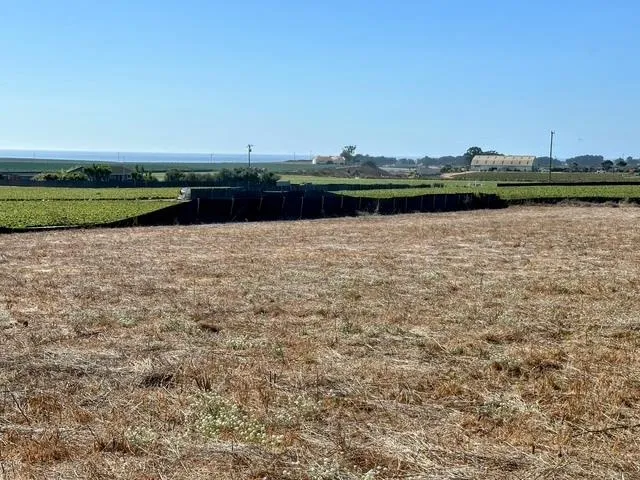 a view of an ocean and an mountain