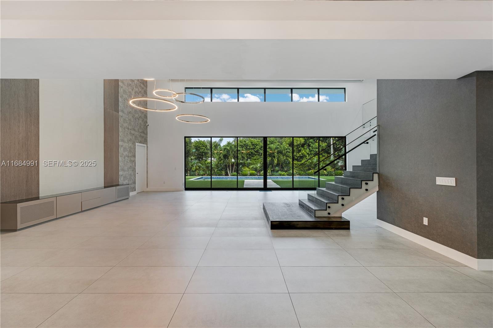 6695 Southwest 112th Street Pinecrest, FL 33156 - Photo 20 of 99 a view of swimming pool with seating space