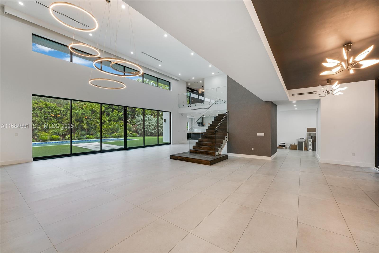6695 Southwest 112th Street Pinecrest, FL 33156 - Photo 21 of 99 a view of a room with gym equipment