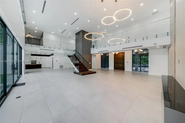 a bathroom with a toilet sink and shower