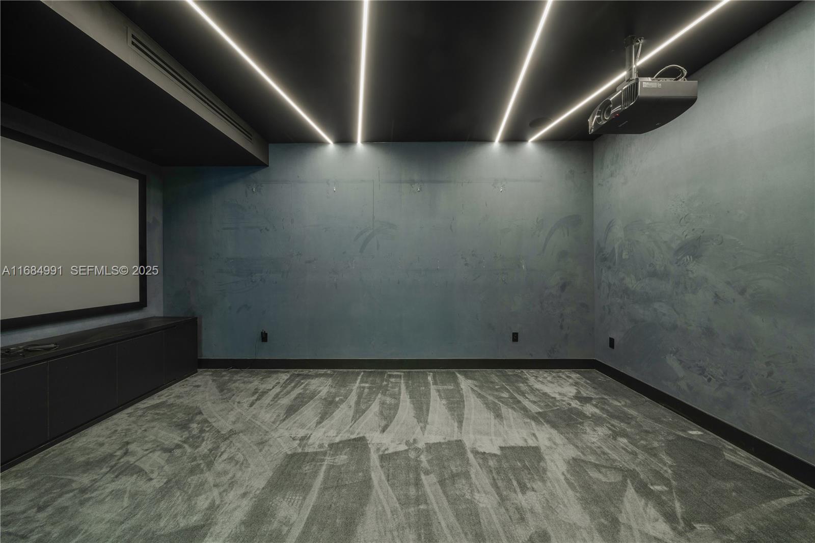 6695 Southwest 112th Street Pinecrest, FL 33156 - Photo 51 of 99 a view of a room with wooden floor and windows