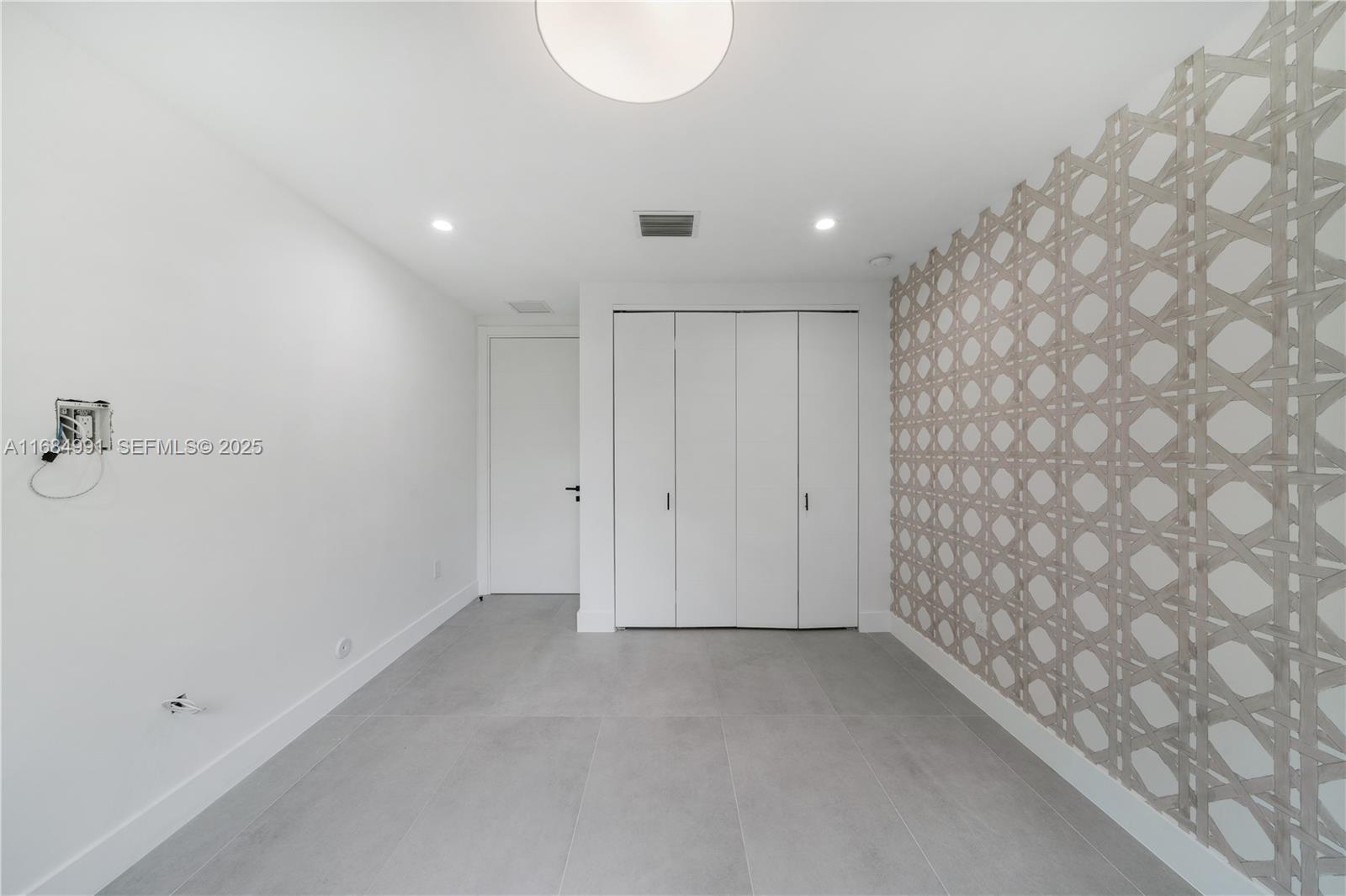 6695 Southwest 112th Street Pinecrest, FL 33156 - Photo 61 of 99 a view of an empty room