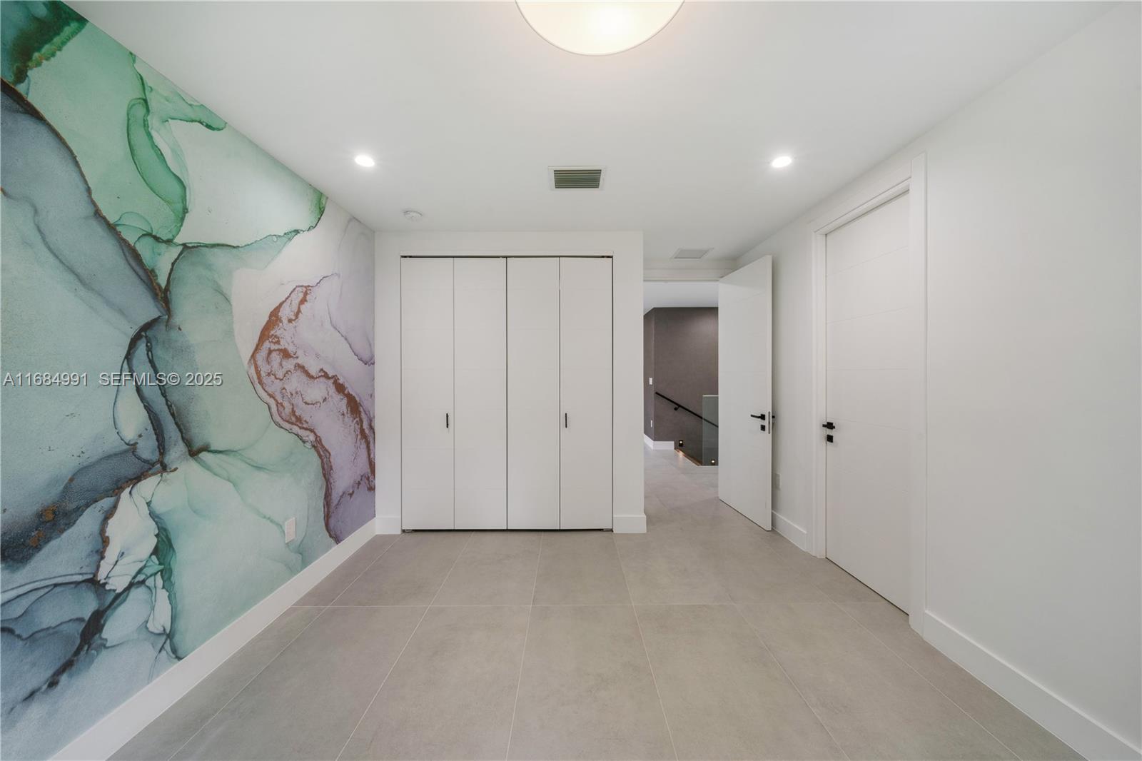 6695 Southwest 112th Street Pinecrest, FL 33156 - Photo 64 of 99 a view of a room with an entryway