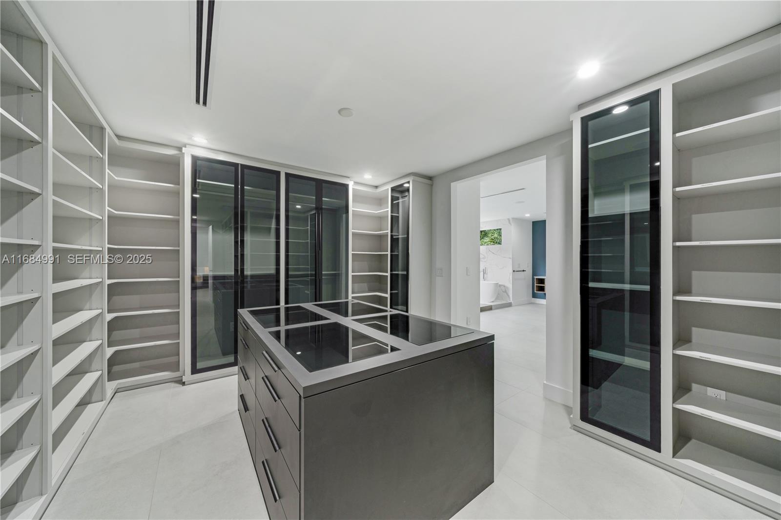 6695 Southwest 112th Street Pinecrest, FL 33156 - Photo 75 of 99 a room with furniture and windows