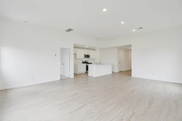 a view of kitchen with wooden floor