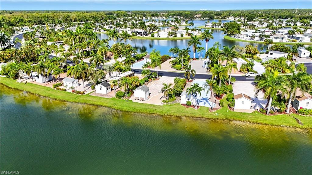 3113 Weathervane Drive Naples, FL 34120 - Photo 12 of 36 a view of a yard with an outdoor space