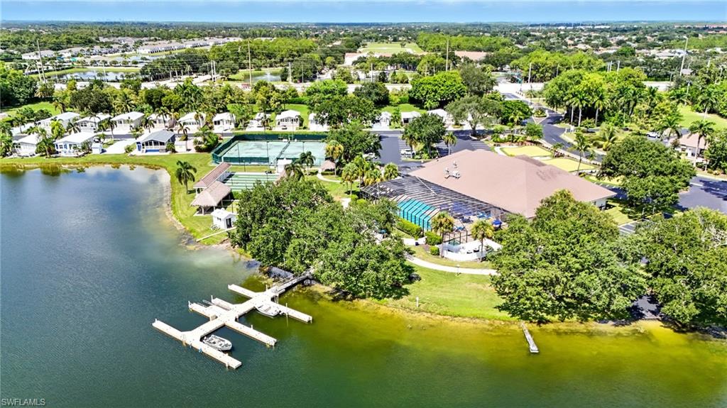 3113 Weathervane Drive Naples, FL 34120 - Photo 22 of 36 a view of a houses with a lake view