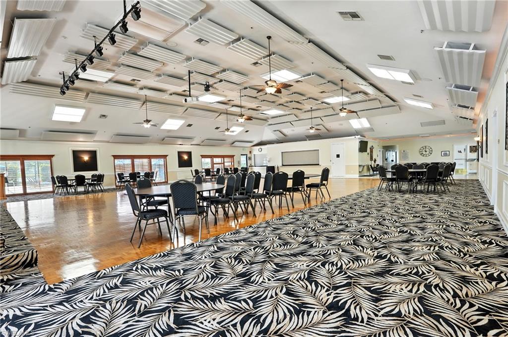 3113 Weathervane Drive Naples, FL 34120 - Photo 28 of 36 a view of a room with lots of wooden furniture