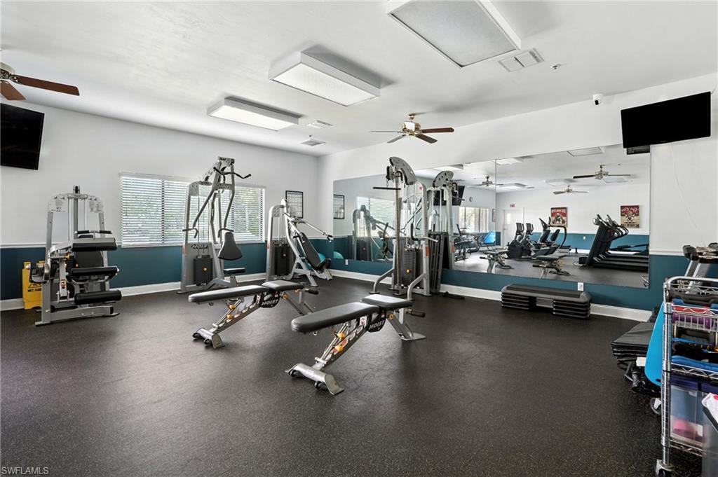 3113 Weathervane Drive Naples, FL 34120 - Photo 32 of 36 a view of a room with gym equipment