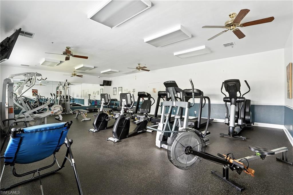 3113 Weathervane Drive Naples, FL 34120 - Photo 34 of 36 a view of a room with gym equipment