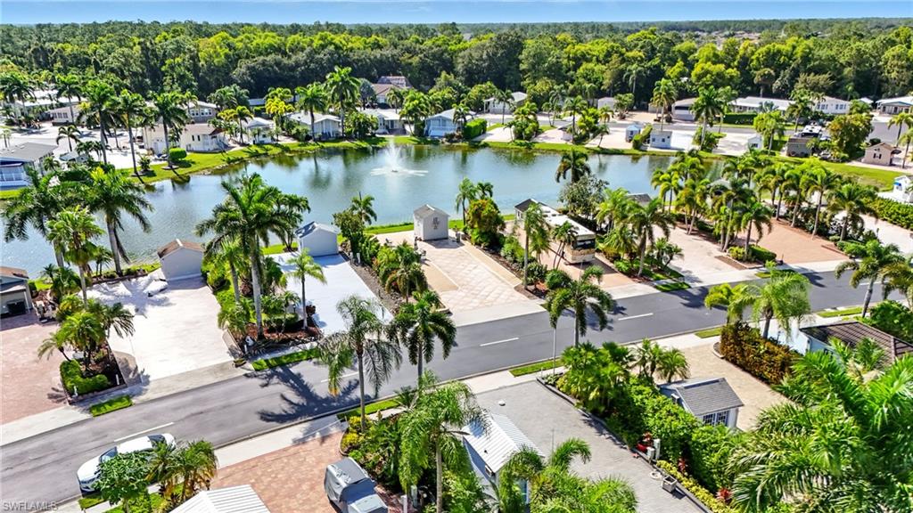 3113 Weathervane Drive Naples, FL 34120 - Photo 9 of 36 an aerial view of residential house with outdoor space and lake view