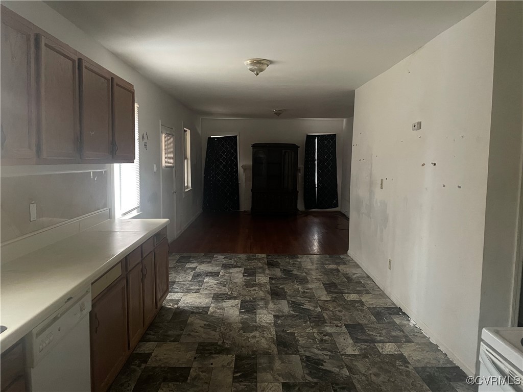 Hallway featuring dark hardwood / wood-style floor