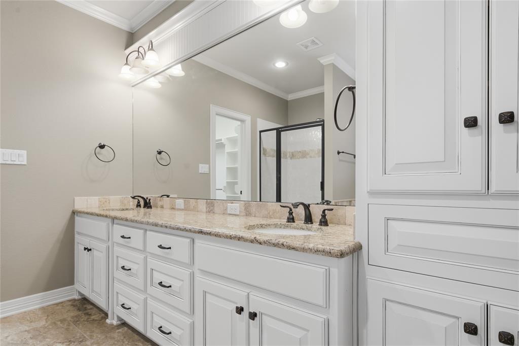 19481 Sandhill Lane Flint, TX 75762 - Photo 17 of 23 a bathroom with a granite countertop sink double and mirror