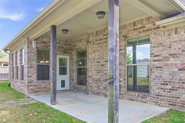 a front view of a house with a porch
