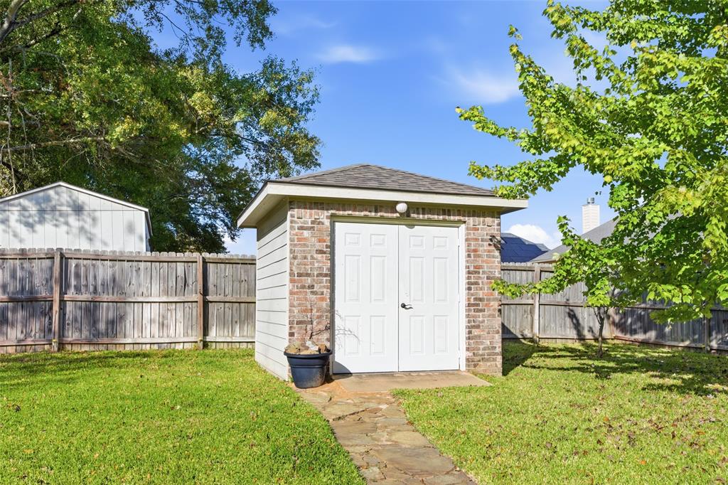 19481 Sandhill Lane Flint, TX 75762 - Photo 22 of 23 a front view of a house with a yard