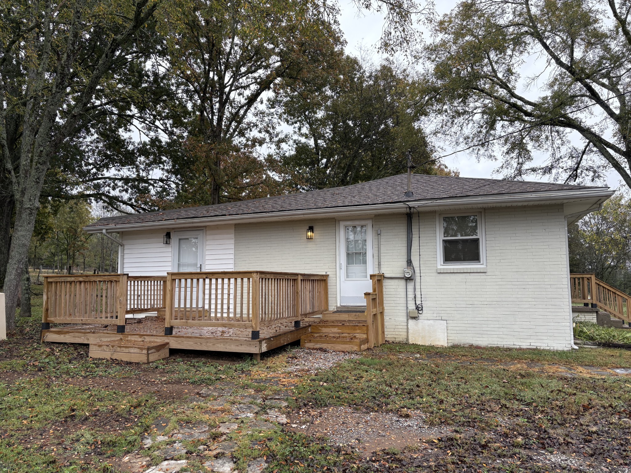 3179 Holly Grove Road Lascassas, TN 37085 - Photo 6 of 15 a front view of a house with a yard
